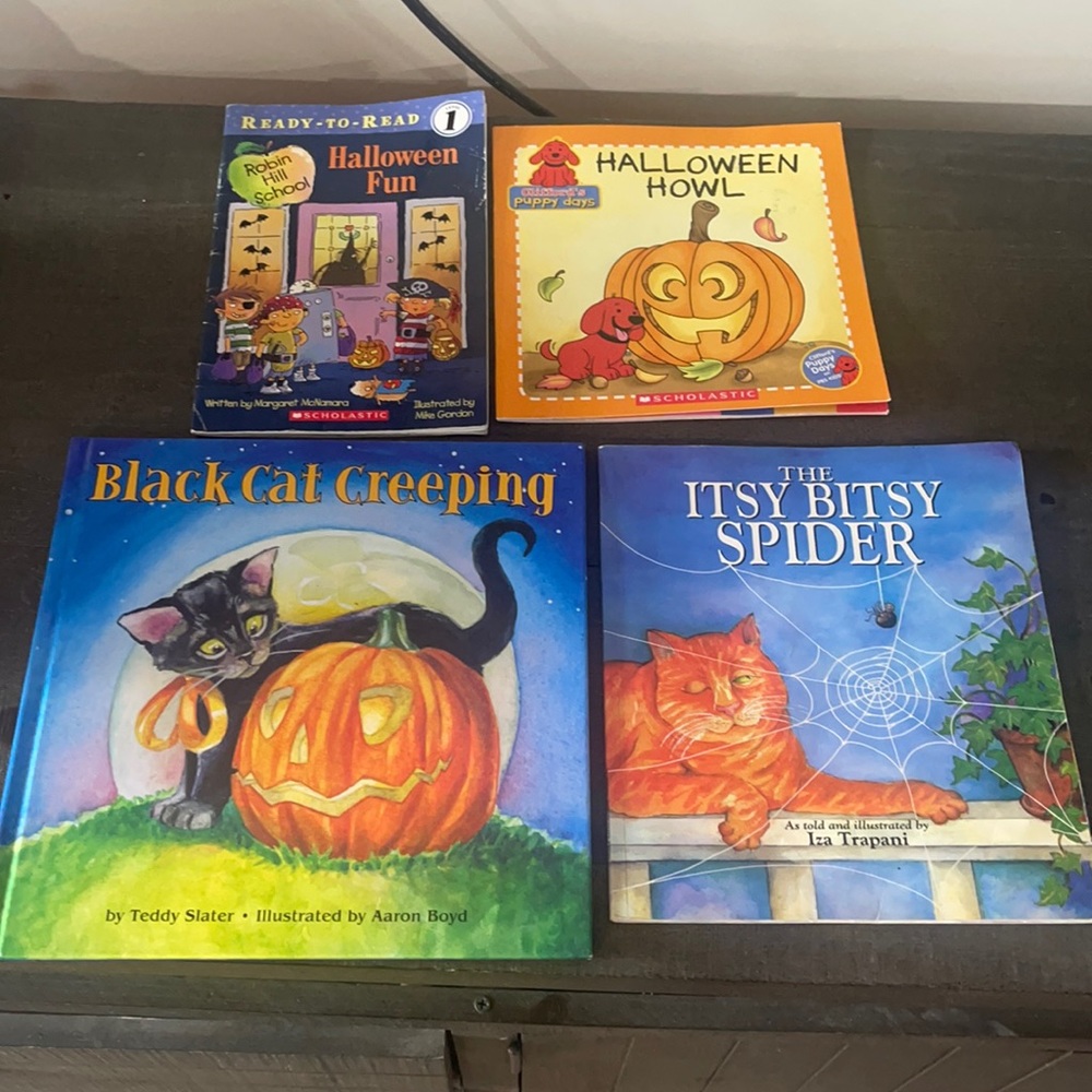 4 scholastic childrens books  one hard cover, three paperbacks.